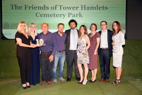 Jo Wood and Lucy Siegle present the Ethical Wildlife award to winners Friends of Tower Hamlets Park Cemetery at the Observer Ethical Awards 2015, held at the V&A Museum in London