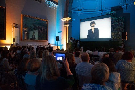 Yoko Ono makes a speech on video as she wins the Lifetime Achievement award at the Observer Ethical Awards 2015, held at the V&A Museum